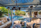 Backyard Seating Area under Pergola toward Po