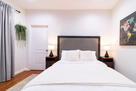 Middle bedroom with queen bed.