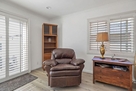 Leather sofa chair in family room.