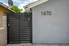 Secured entrance metal gate with smart lock