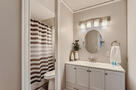 Clean, modern bathroom with lots of light and
