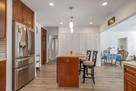 Wash/Dry in kitchen behind bi-fold doors.  We