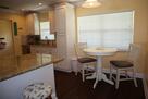 Eat in kitchen plus more seating at the bar