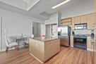 Kitchen w/ Washer/Dryer