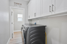 Laundry room with washer and dryer