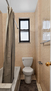 Bathroom with bathtub, shower curtain, and wi