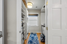 Upstairs walk in closet for primary suite