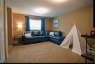2nd living room in lower level with TV