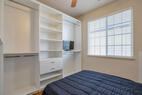 Bedroom with custom closet system