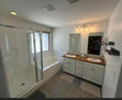 Dual vanities and separate tub and shower