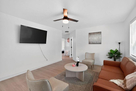 Neutral d&eacute;cor, warm lighting, and an open la