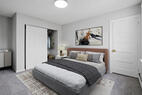 Master bedroom with comfortable queen bed