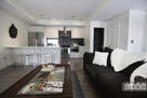 Living Room with view of Kitchen