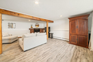 Family Room Wide View with Fireplace and Armo
