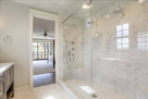 Oversized marble shower with 10 jets with rem