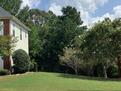 Large corner property completely fenced in