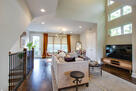 Bright living room with comfy seating and sma