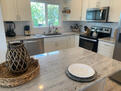 Full Kitchen with large Island/Work Surface