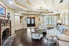 A light-filled living area with fireplace.