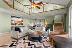 Open concept living and dining room two story