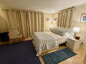 Nigh time bedroom sanctuary with seating 9