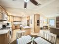 Dining area to kitchen and living room front