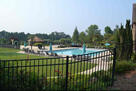 Fenced in pool area & splash park