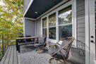 Relax on the covered patio with lounge chairs