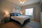 King bed & TV in Primary Suite