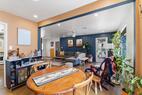 Dining room space with full size modern bar
