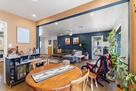 Dining room space with full size modern bar