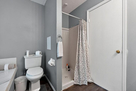 Hallway Bathroom with a tub