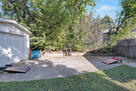 extra parking located in backyard by garage