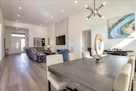 Dining open to Living Room with 14 foot ceili