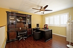Full office with PC workstation and dark wood