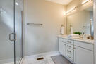 Luxurious double vanity sink and walk in rain