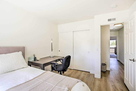 Single bed with office off hallway