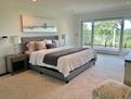 Main level primary bedroom suite