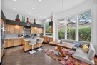 Scandinavian banquette  in light filled bay w