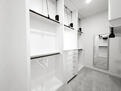 Primary bedroom walk-in closet