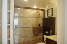 En suite bathroom with walk-in shower  and st