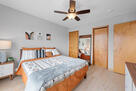 Queen bed with bathroom access and closet