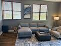 Living room with windows in two directions