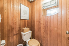 Toilet in laundry room