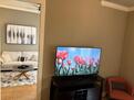 55 inch flat screen TV in Bedroom