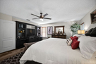 Main bedroom large wall unit with big screen 