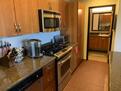 Kitchen and Entrance to Guest Bathroom