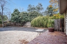 Driveway, rear deck and open parking area