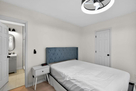 A spacious, serene retreat featuring a plush 