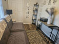 Front view of Den with a Full-size Futon